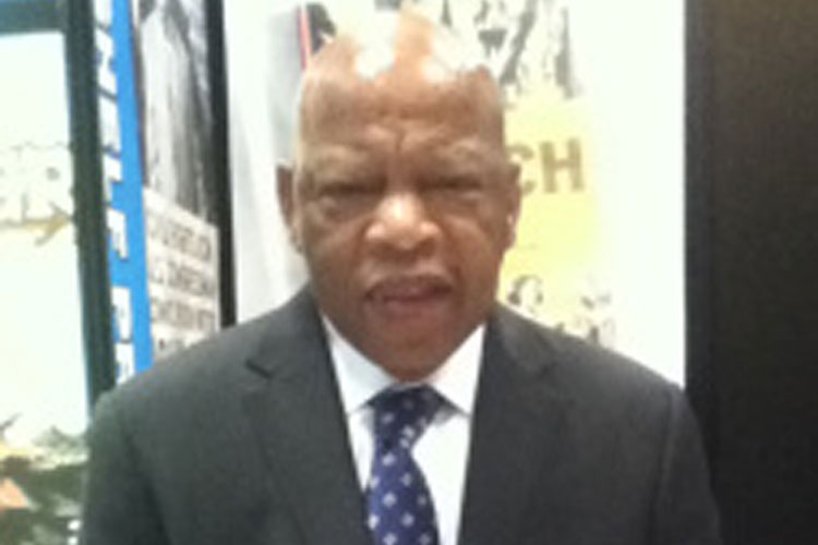 John Lewis poses for a picture at the Book Expo America in New York City. 