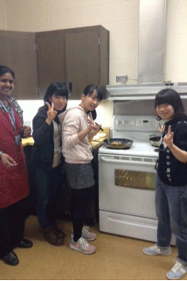 Japanese students happily cooking in Ms.Ashoks first period class.