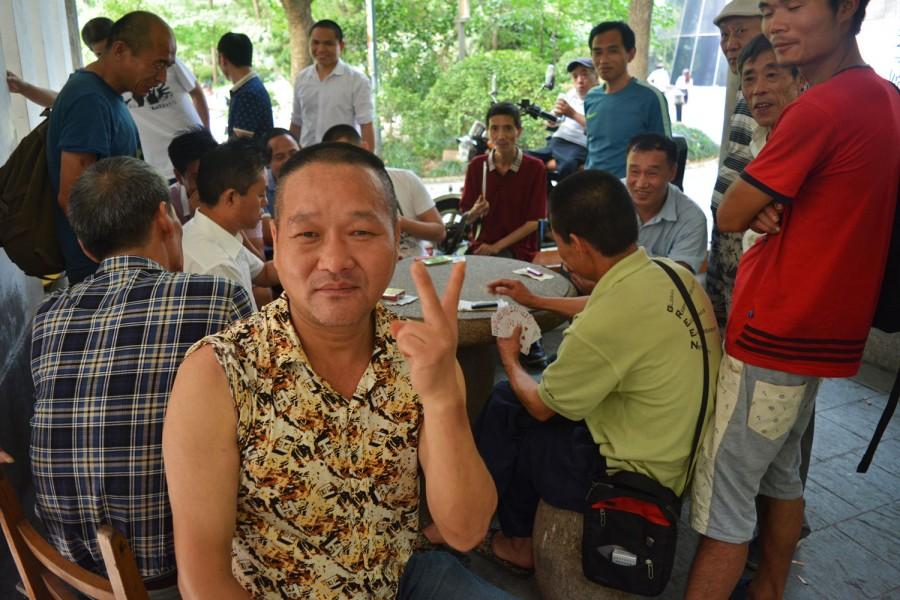A man poses for the camera in People's Park