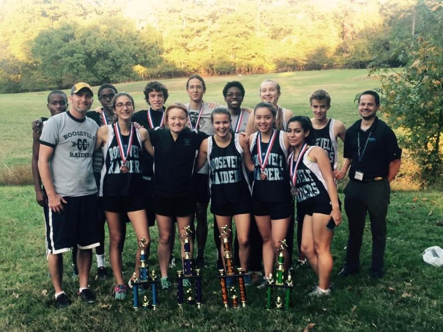 The cross country girls and boys teams after winning county championships. 