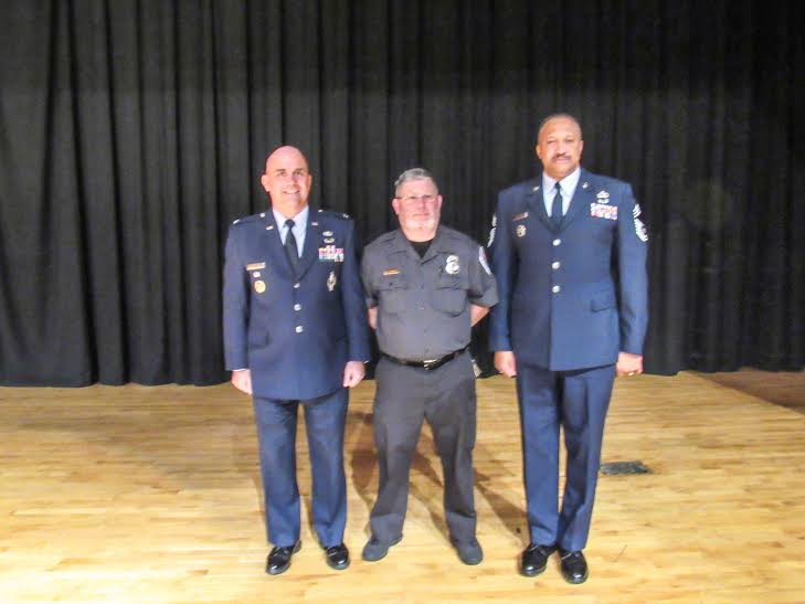 Colonel Ryan on the left, Chief Hollis and  