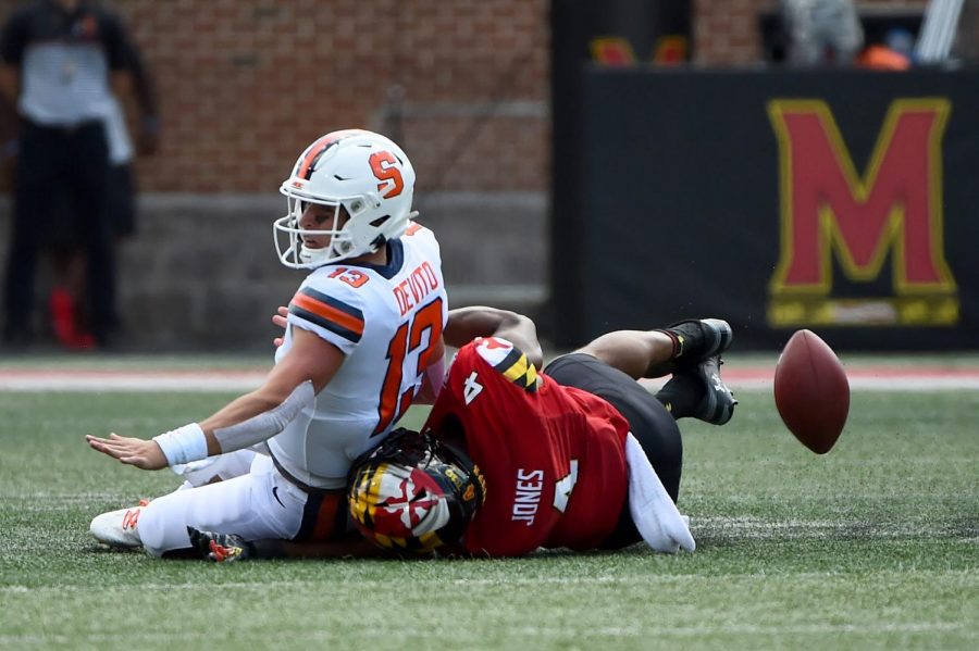 Maryland Terrapins linebacker Keandre Jones (4) forces Syracuse Orange quarterback Tommy DeVito (13) to fumble during the first half of an NCAA college football game, Saturday, Sept. 7, 2019, in College Park, Md. (AP Photo/Will Newton) Associated Press
