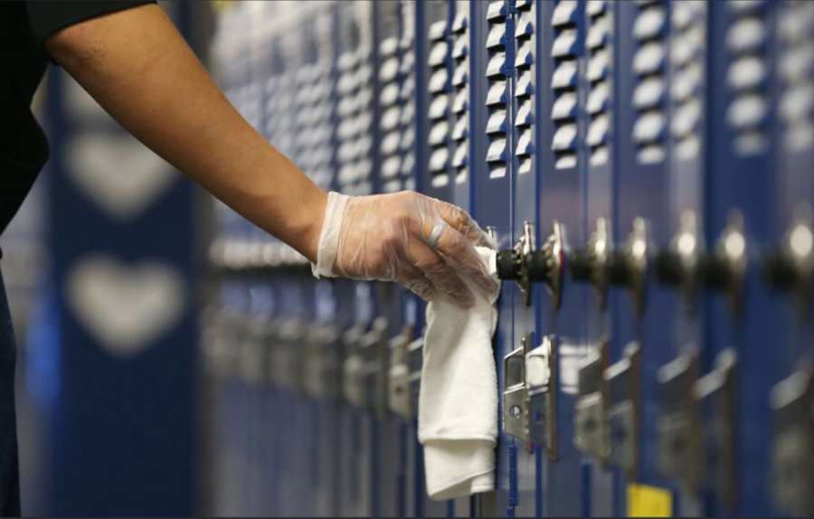 A+custodian+sanitizing+lockers.