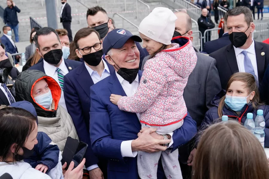 Image from the Washington Post (Evan Vucci/AP) that showcases President Biden meeting with Ukrainian refugees in Warsaw