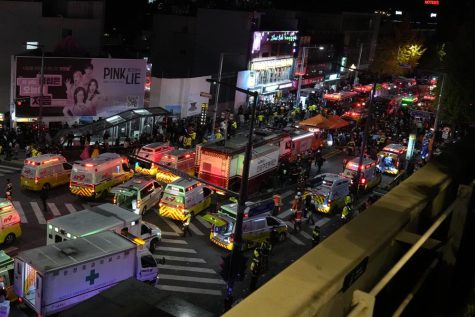 Ambulances arriving close to the scene in Seoul, after the crowd surge occurred on October 30, 2022. Photo by Lee jin-man, courtesy of AP News.