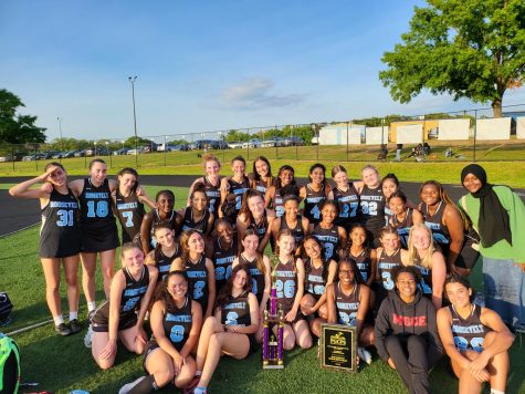 The 2023 Girls lacrosse team and their county championship trophy on May 8th, 2023. 