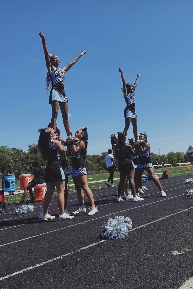 Roosevelt cheerleaders at the Raiders first game of the season.