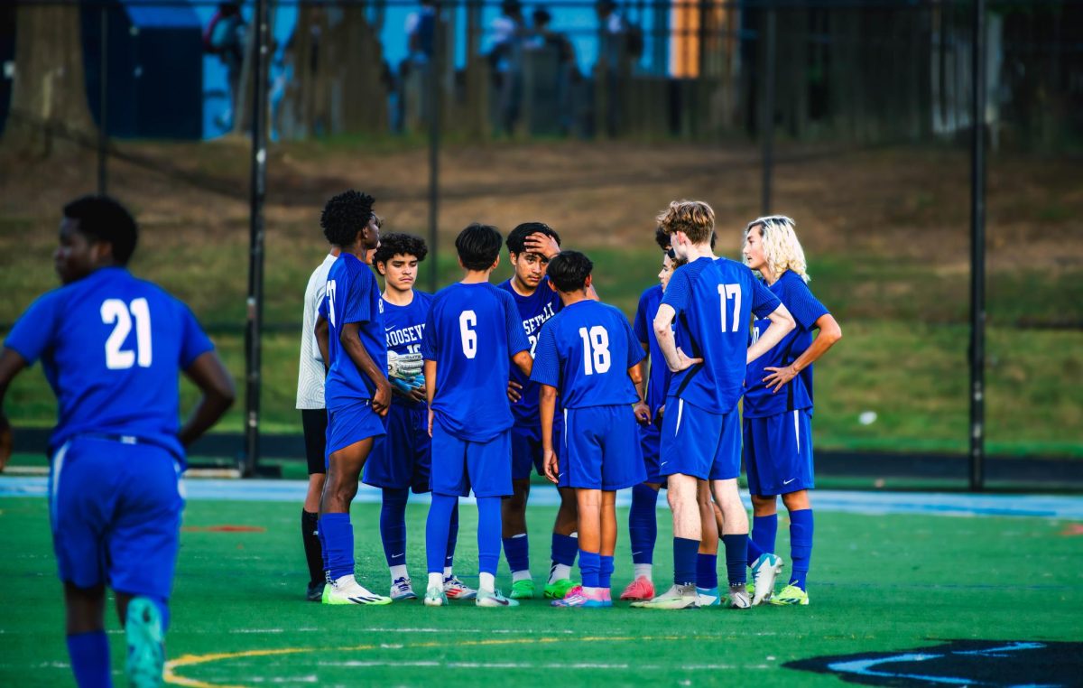 Players strategize for the following play.
