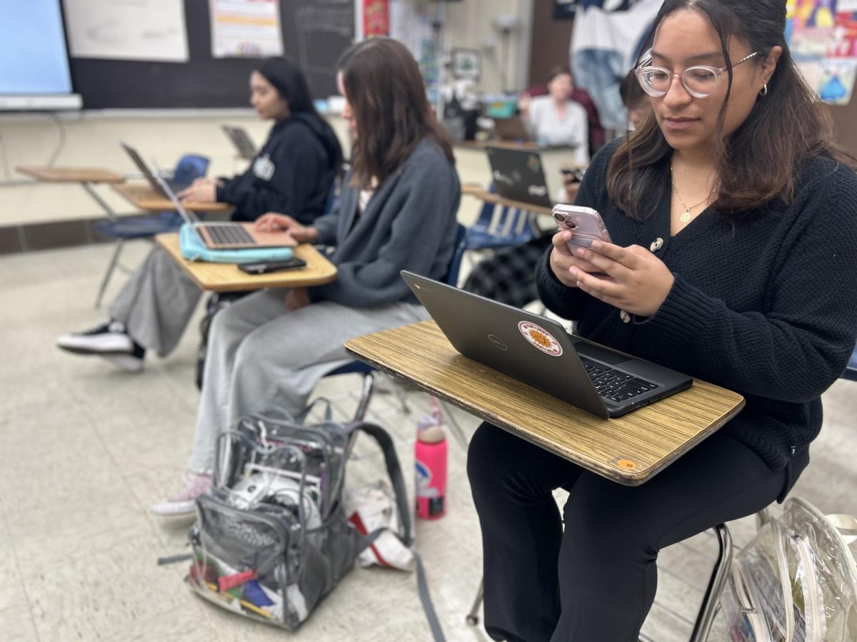 Student on their phone during class.