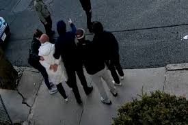 Turkish woman "Rumeysa Ozturk", a Tufts University student being detained by disguised ICE agents.