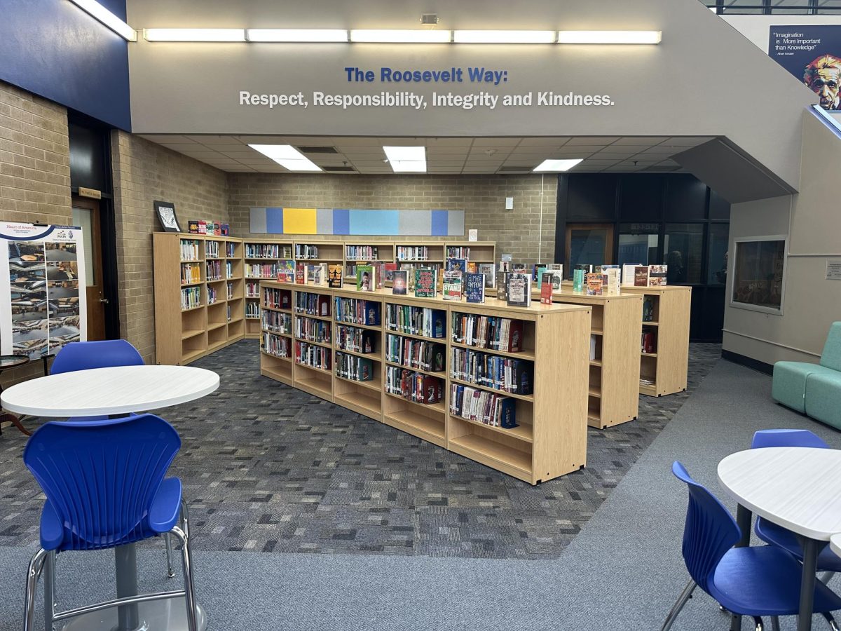 A new perspective of the library with books scattered on shelves.