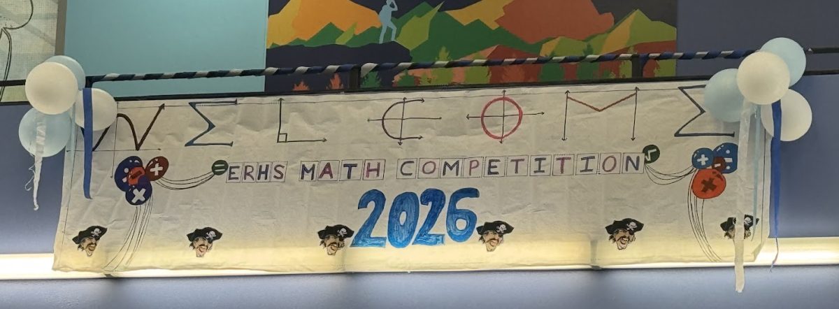 A banner hanging over the Media Center reading "Welcome ERHS Math Competition 2026"
Photo by Anna Chen
